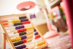 A child's abacus in a daycare center.